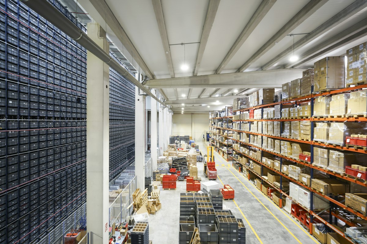 Crates stacked inside a cold-storage warehouse